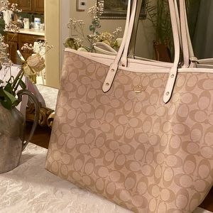 Genuine Coach. New! tags still on. Cost $350. Beige, cream. 18”Wide x 13” Deep.